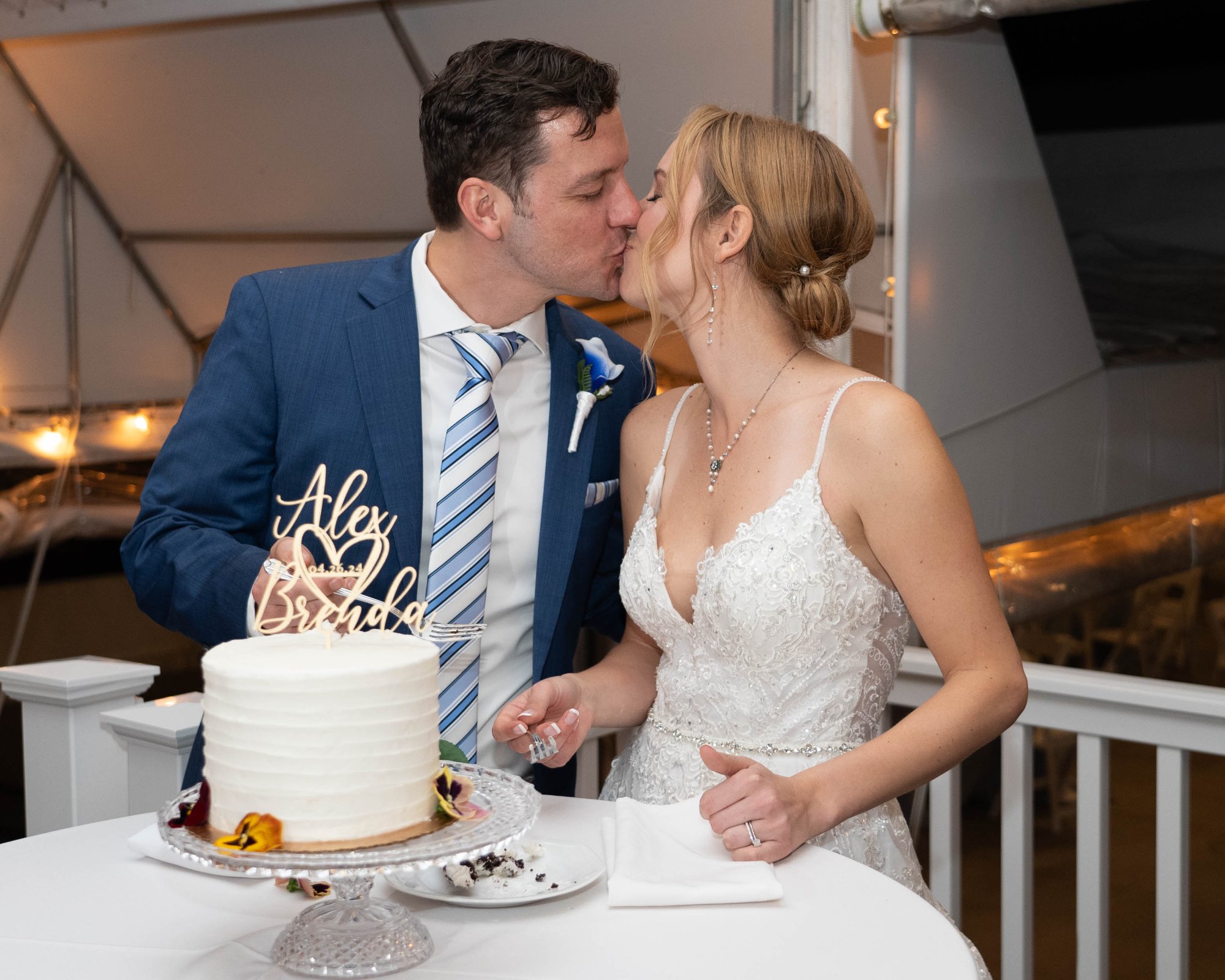 Couple cake cutting kiss